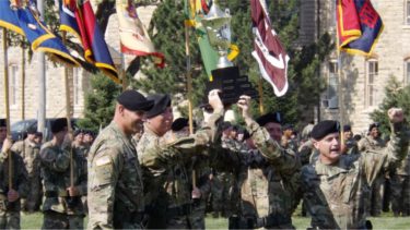 Members of the 97th Military Police Battalion celebrated their Victory Cup win with Maj. Gen. Wayne W. Grigsby, Jr. (Staff photos by Brady Bauman) 