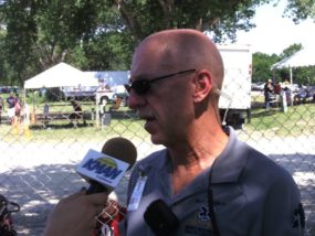 Riley County EMS director Larry Couchman takes questions at Country Stampede at Tuttle Creek State Park. (File photo)