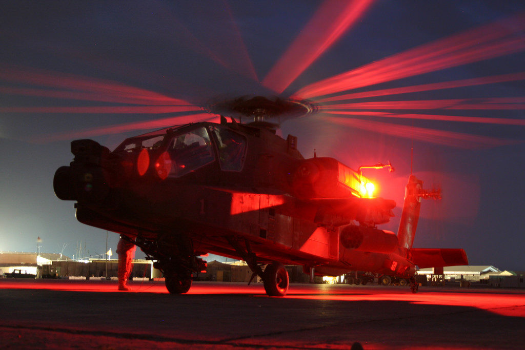 An AH-64D Apache Longbow helicopter gunship from the 1st Attack Reconnaissance Battalion, 1st Aviation Regiment, prepares for a night mission on May 31. The 1-1 ARB Gunfighter air and ground crews work around the clock sustaining air operations and are part of the Combat Aviation Brigade, 1st Infantry Division, from Fort Riley, Kan., flying in support of Task Force Iron, 1st Armored Division, in northern Iraq. (Photo by U.S. Army Maj. Enrique T. Vasquez)