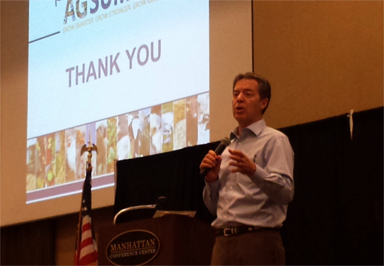 Kansas Gov. Sam Brownback makes closing remarks during the first-ever 201 Kansas Governor's Summit on Agricultural Growth Tuesday afternoon in the Manhattan Conference Center. (Staff photo by Brady Bauman)