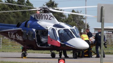 Emergency crews load an unidentified crash victim into a Life Star helicopter Monday afternoon. (Staff photos by Brady Bauman)