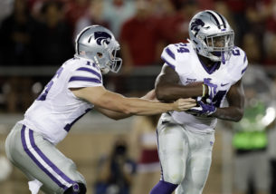 Kansas State running back Charles Jones, right, gets a handoff from quarterback Jesse Ertz during the second half of an NCAA college football game against Stanford on Friday, Sept. 2, 2016, in Stanford, Calif. (AP Photo/Marcio Jose Sanchez)