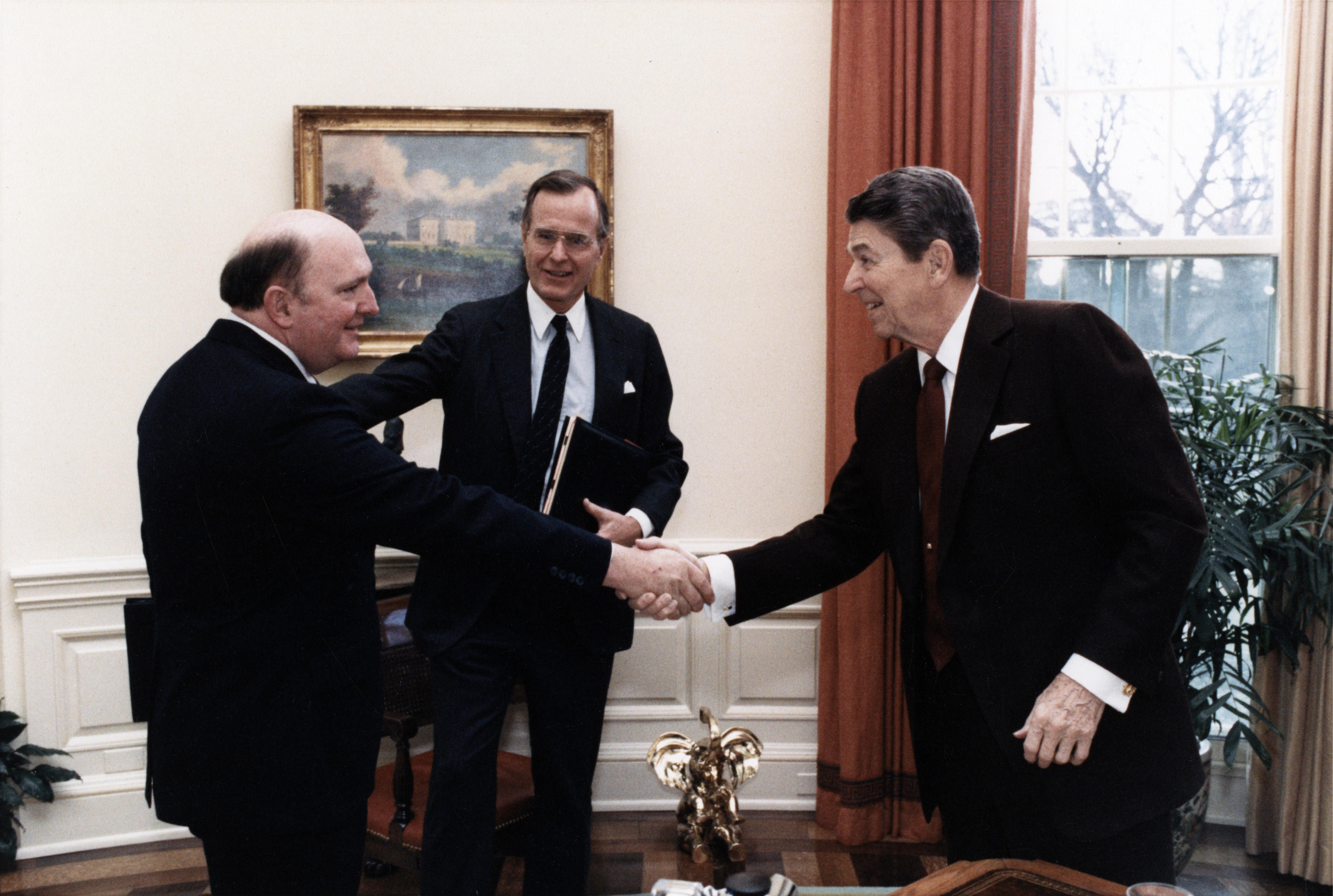 Marlin Fitzwater was serving as Vice President Bush's press secretary in 1987 when President Reagan asked him to serve as his press secretary. According to Fitzwater, "This is the moment when George Bush took me to the Oval Office and said, 'I'm turning him over to you, sir.'"