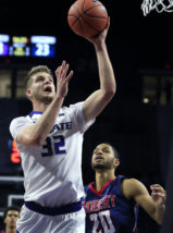 Kansas State forward Dean Wade (32) shoots while covered by Robert Morris forward Billy Giles (20) during the second half of an NCAA college basketball game in Manhattan, Kan., Tuesday, Nov. 22, 2016. (AP Photo/Orlin Wagner)