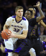 Kansas State forward Dean Wade (32) looks for a teammate while covered by Prairie View A&M guard Ja'Donta Blakley, right, during the first half of an NCAA college basketball game in Manhattan, Kan., Tuesday, Dec. 6, 2016. (AP Photo/Orlin Wagner)
