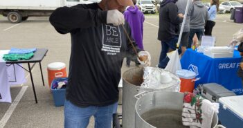 Young Trustees serve chili to the masses for good cause