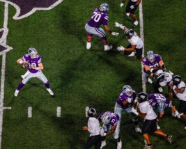 Kansas State quarterback Will Howard sets up for a pass downfield.