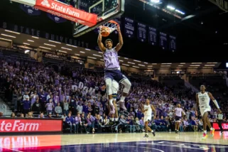K-State players and fans celebrate a 73-60 win over West Virginia