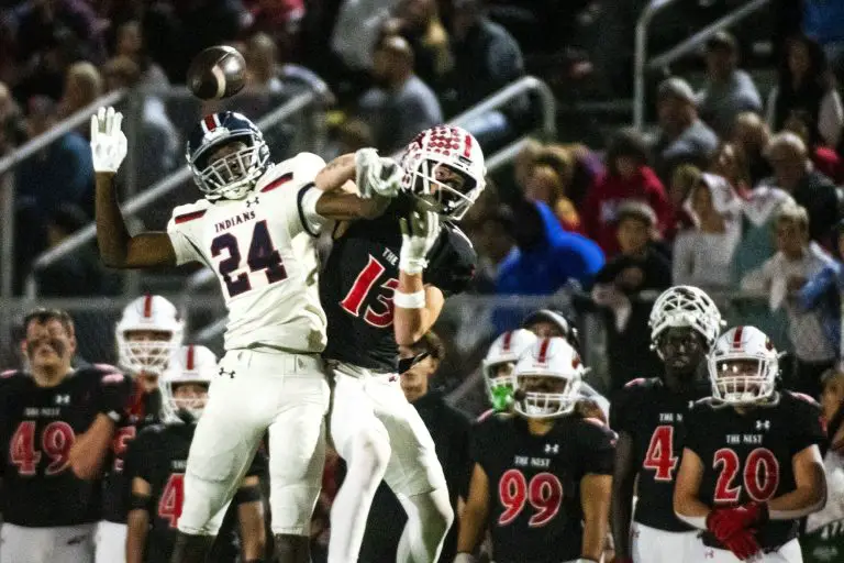 Manhattan High football secures sub-state berth, beating No. 1 Maize 55-31