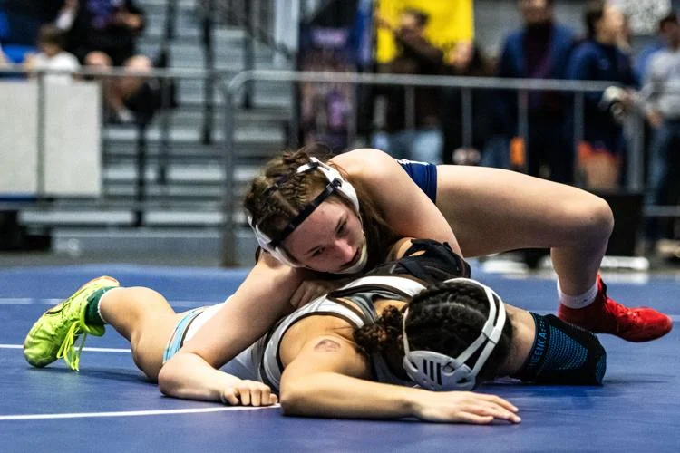 Slifer, Hoeme lead Manhattan High girls’ wrestling to 4th at state