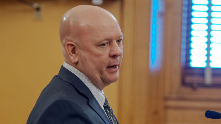 Kansas banking officials ask lawmakers to hold social media, phone companies liable for fraud