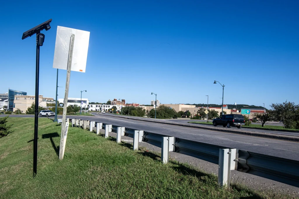 A Flock camera stands watch near the on- and off-ramps of the Kansas highways 18 and 177 interchange in Manhattan. There are 11 total around the city. Staff photo by Lewis Marien